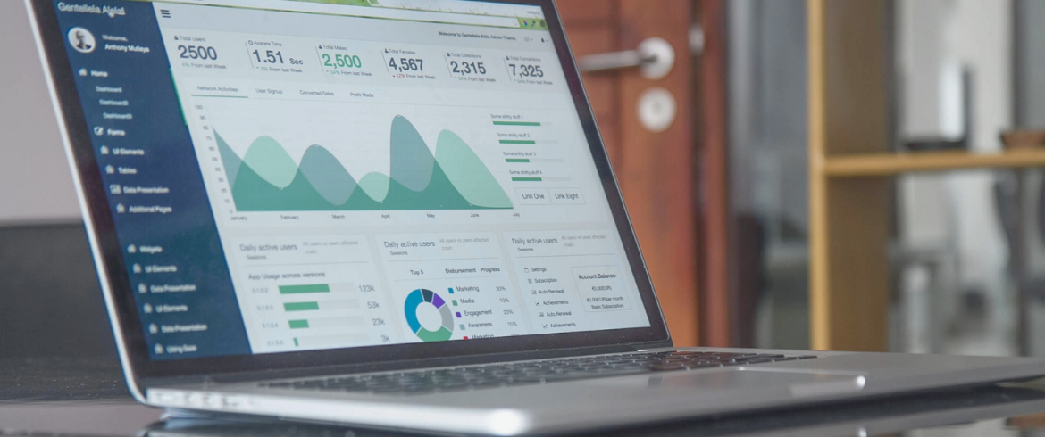 Image of a laptop showing data on screen